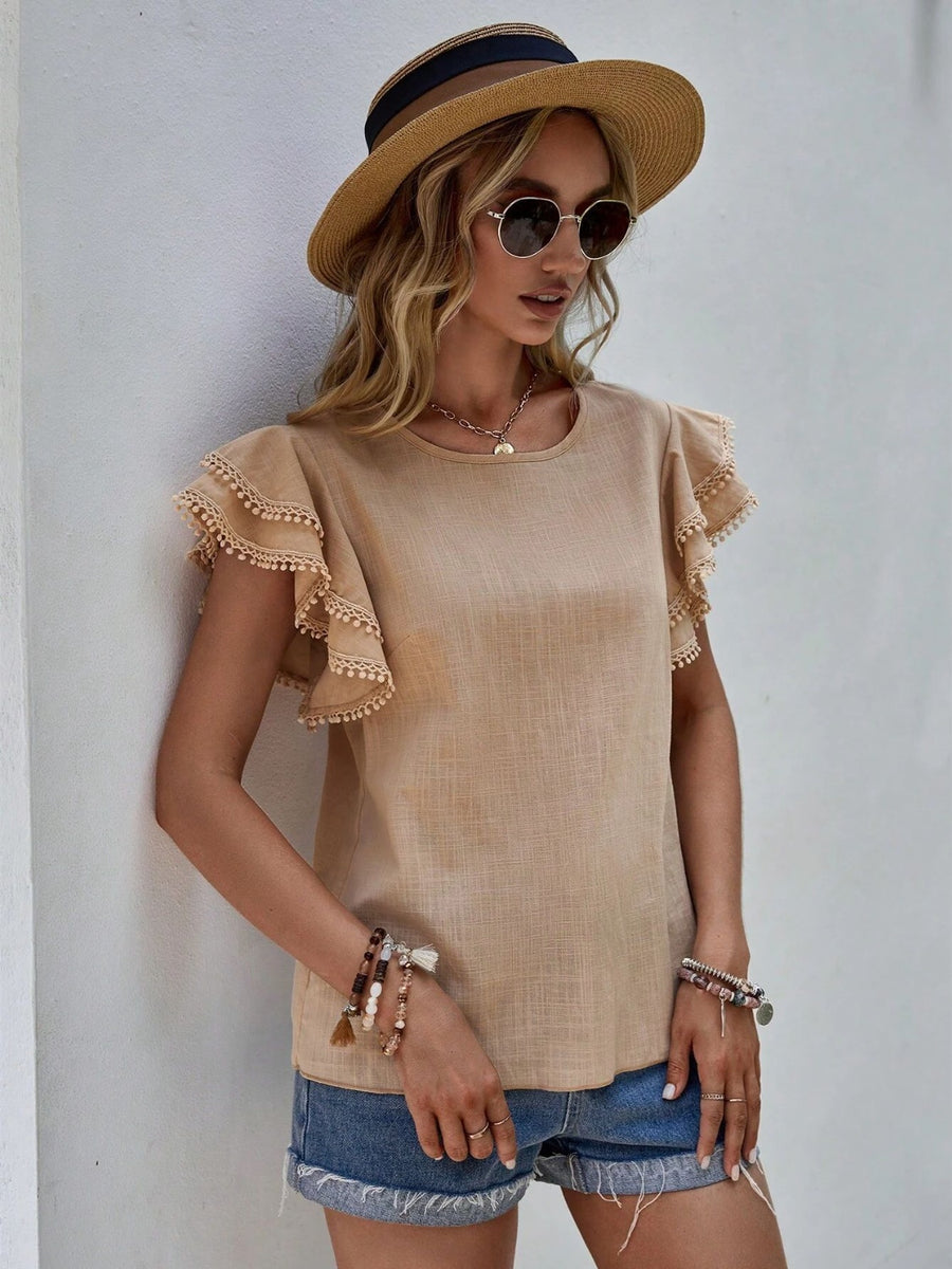 Khaki linen blend top with pom-pom trimmed ruffle sleeves and round neckline.
