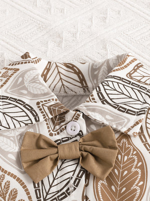 Baby bow top with leaf print and button detail in beige and camel.