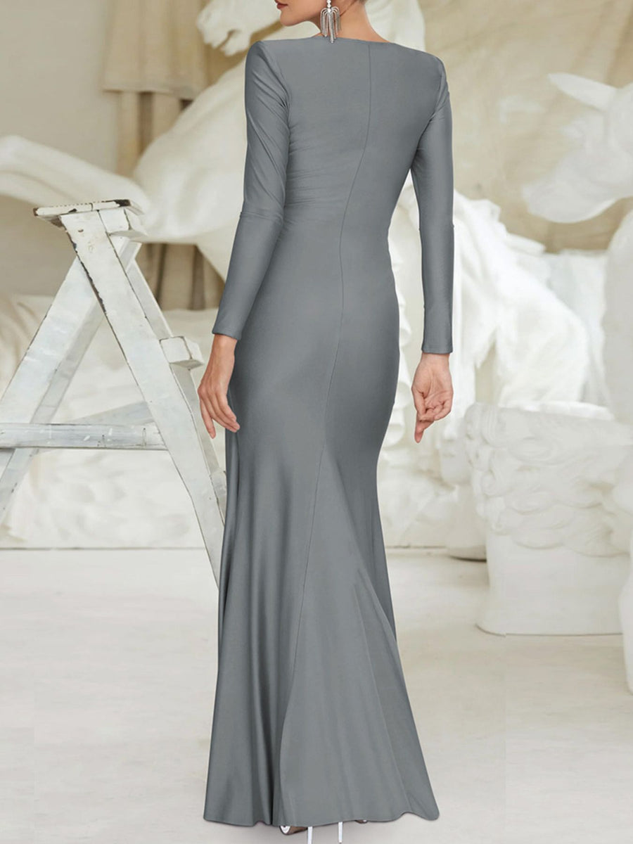 Gray ruched knot front maxi dress with long sleeves and a fitted silhouette.