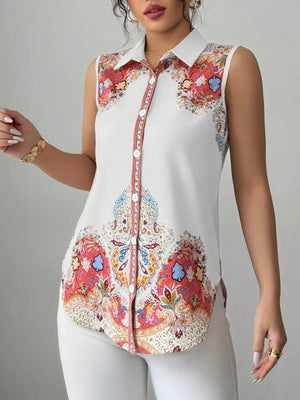 Vibrant paisley collared sleeveless white shirt with button front.