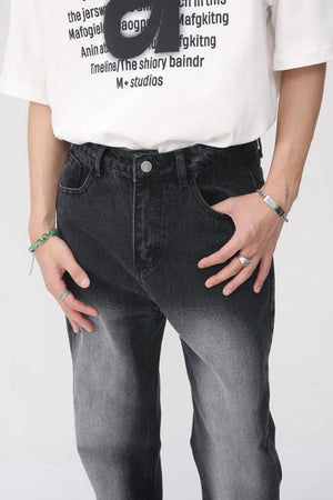 Faded wash baggy jeans in dark with a gradient effect, relaxed fit.