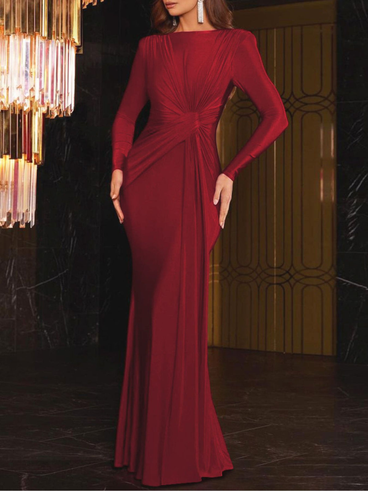 Red ruched knot front maxi dress with long sleeves and a flattering silhouette.