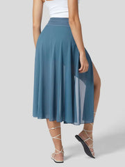 Flowy midi skirt in Lake Blue with a thigh-high slit and shorts liner, featuring a drawstring waist.
