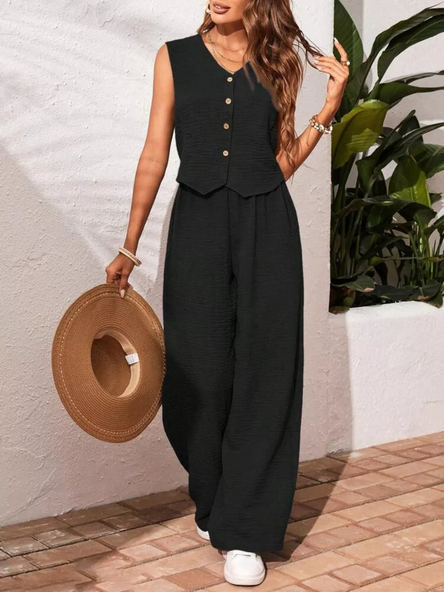 Black buttoned cropped vest and wide-leg pants set with textured fabric