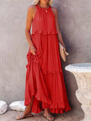 Red ruffled maxi dress with halter neckline and tiered skirt.