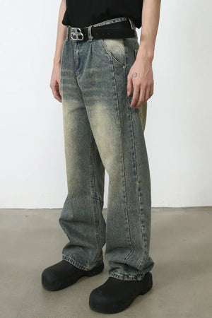 Faded wash baggy carpenter jeans in medium with a relaxed fit and vintage wash.
