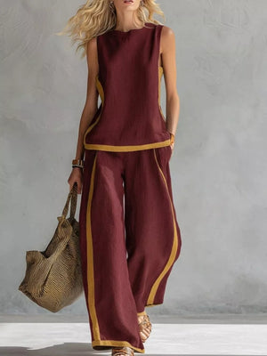 Wine red sleeveless tank and wide-leg pants set with yellow trim, polyester, women's outfit.