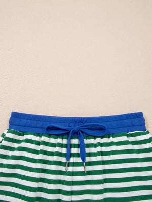 Green and white striped cotton shorts with blue drawstring waist