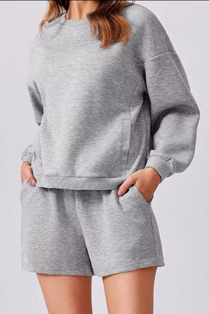 Light Gray cozy two-piece sweatshirt set with crewneck sweatshirt and drawstring shorts.