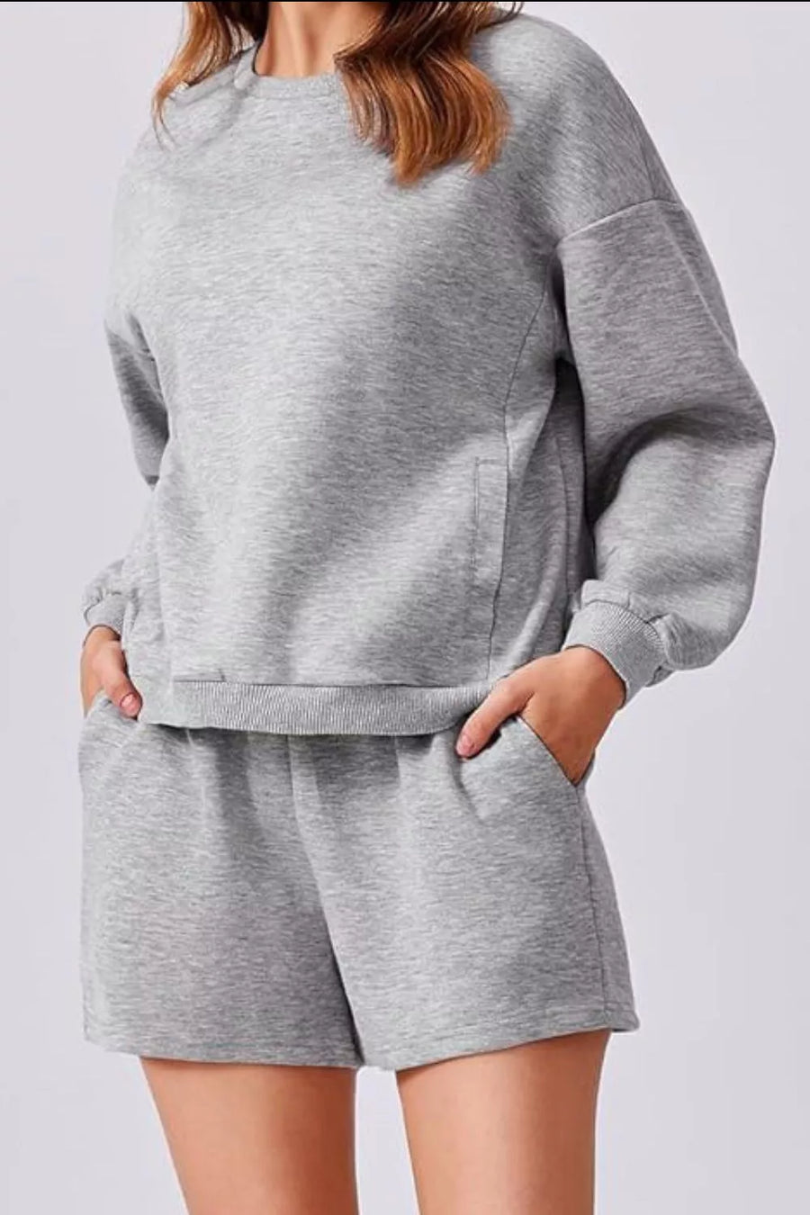 Light Gray cozy two-piece sweatshirt set with crewneck sweatshirt and drawstring shorts.