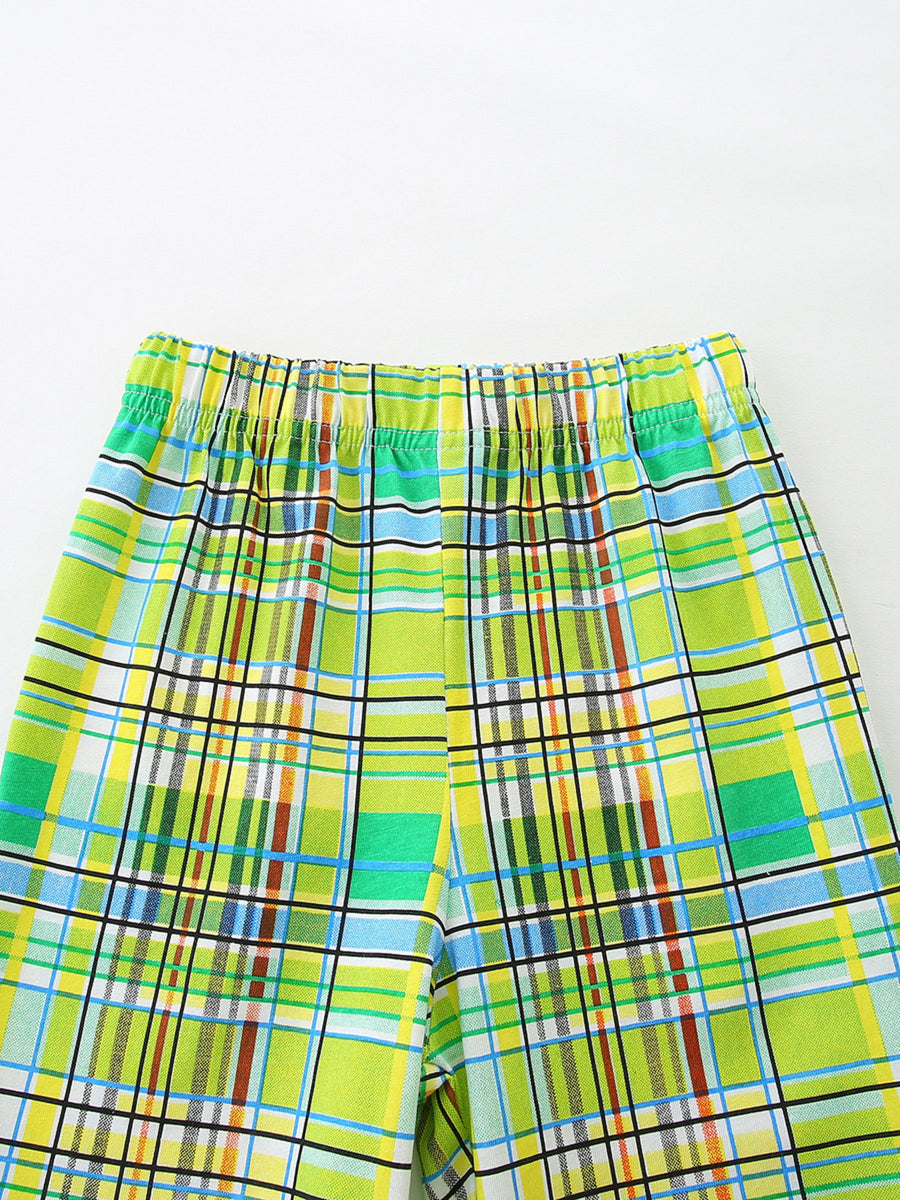 Baby shorts with green, yellow, blue, and brown plaid pattern and elastic waistband.