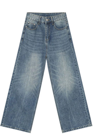 Wide-leg washed denim jeans in medium blue with a relaxed fit.