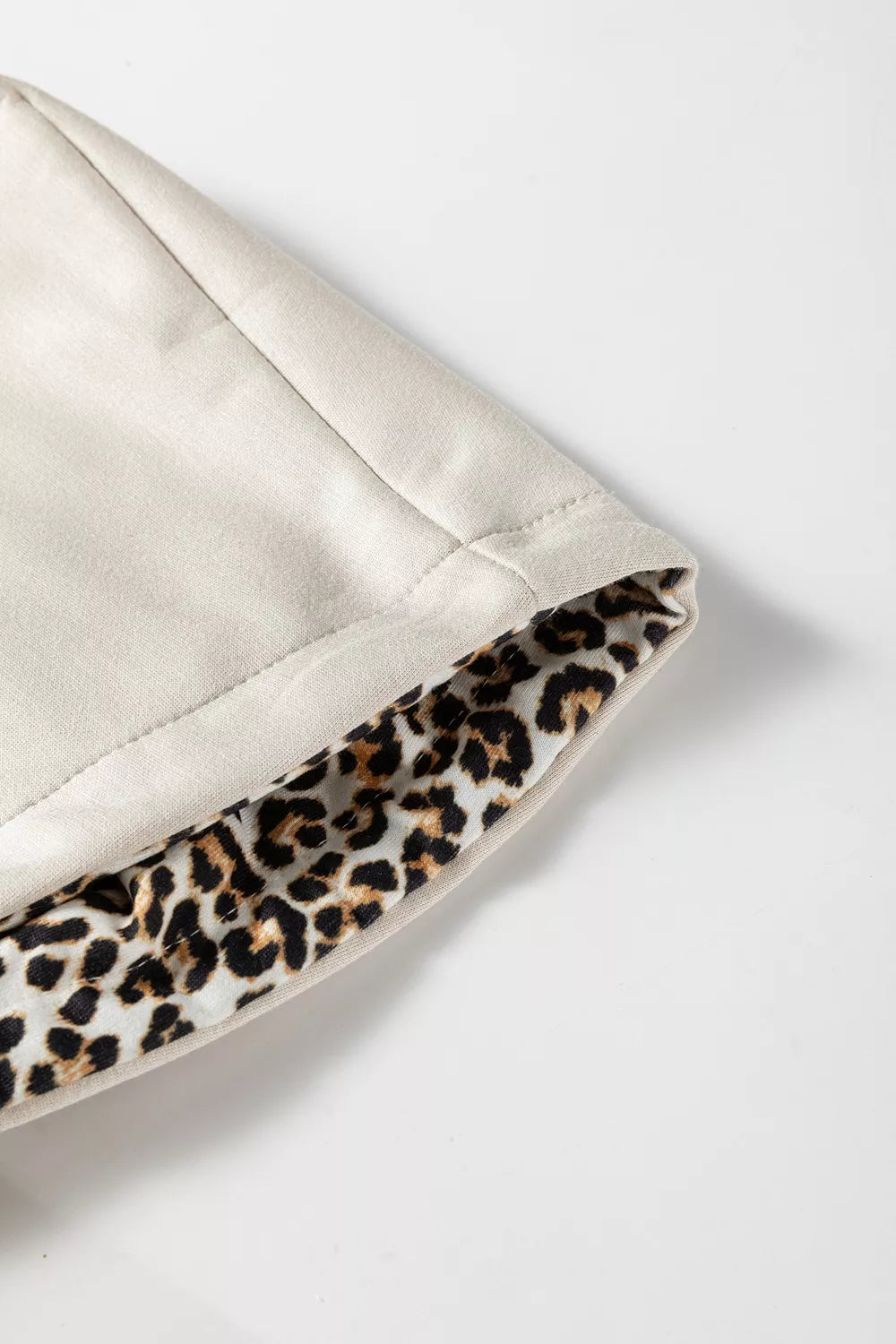pullover hoodie featuring leopard-print in Beige with 50% polyester, 45% viscose, 5% elastane Care instructions: Machine