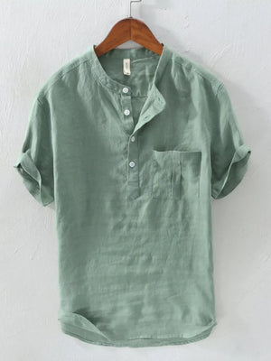 Green cotton blend band collar shirt with button detail and chest pocket.