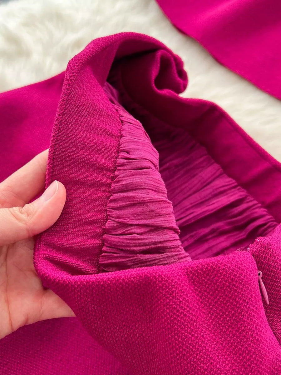 Sheer two-piece set in fuchsia with button details and ruched fabric.