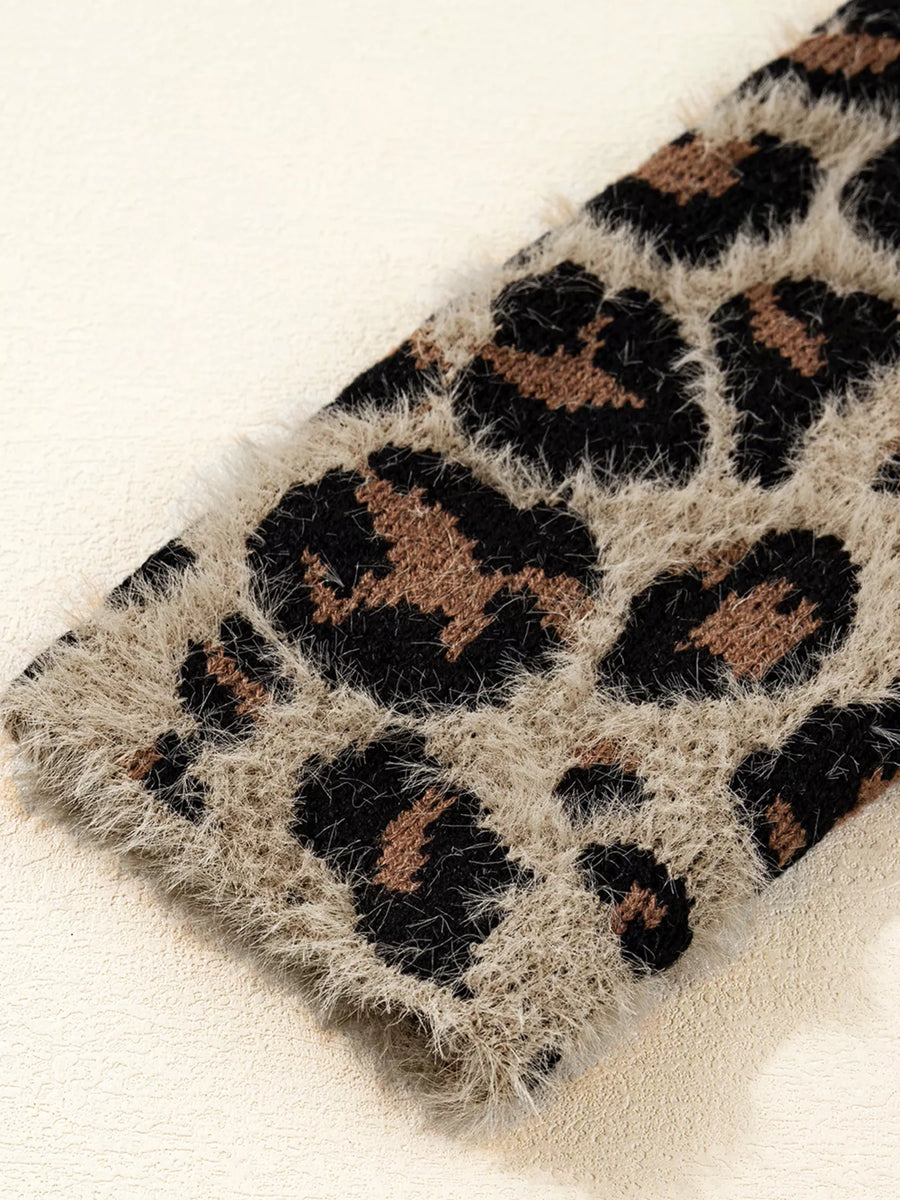 Leopard print fuzzy knit cardigan with a soft texture.