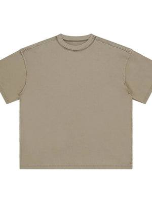 Beige washed cotton t-shirt with raw seams and crew neck.