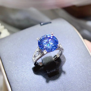 silver ring featuring moissanite and geometric
