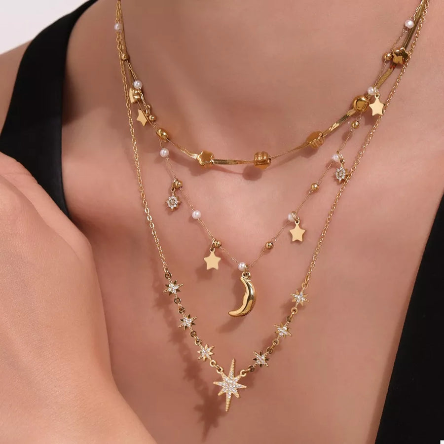 necklace in Style A with celestial and layered design