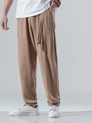 Men's coffee relaxed fit casual sweatpants with drawstring waist and pockets.
