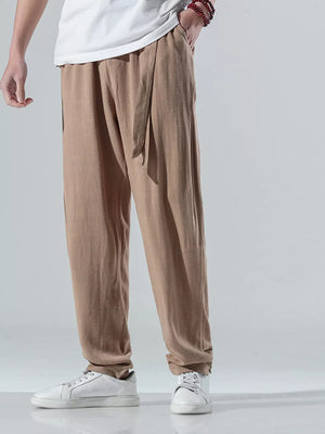 Men's coffee relaxed fit casual sweatpants with drawstring waist and pockets.