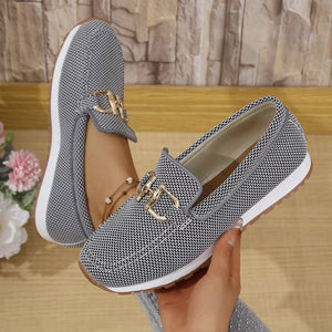 Chic mesh slip-on loafers with gold buckle detail and breathable design.