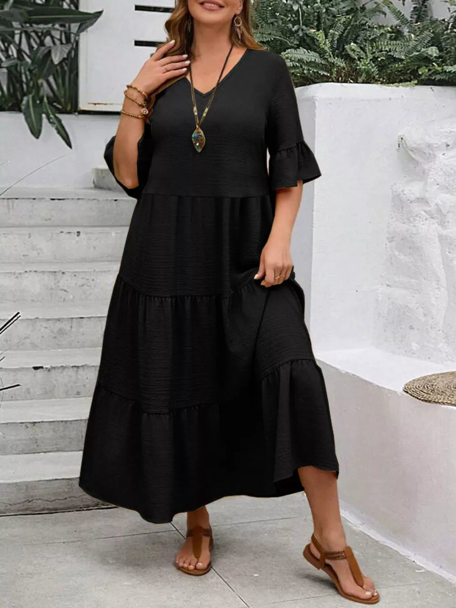 Black tiered midi dress with ruffle sleeves and V-neck