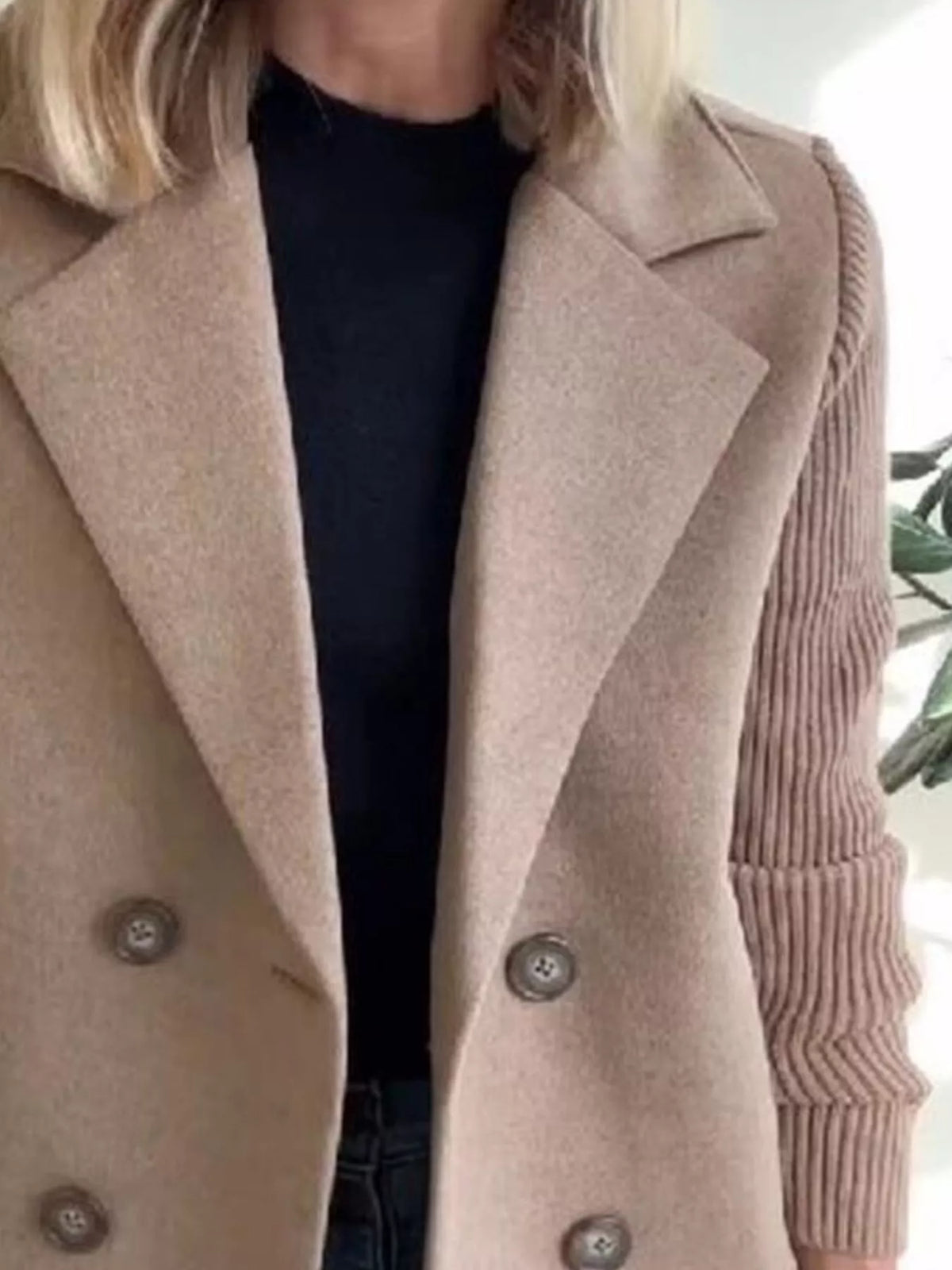 Double-breasted khaki wool blend blazer with ribbed knit sleeves and button detail.
