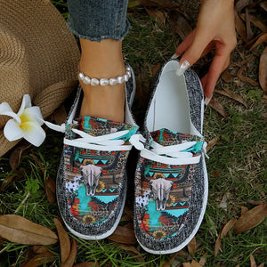 Embroidered canvas slip-on flats with bull skull and floral print, rope detail.
