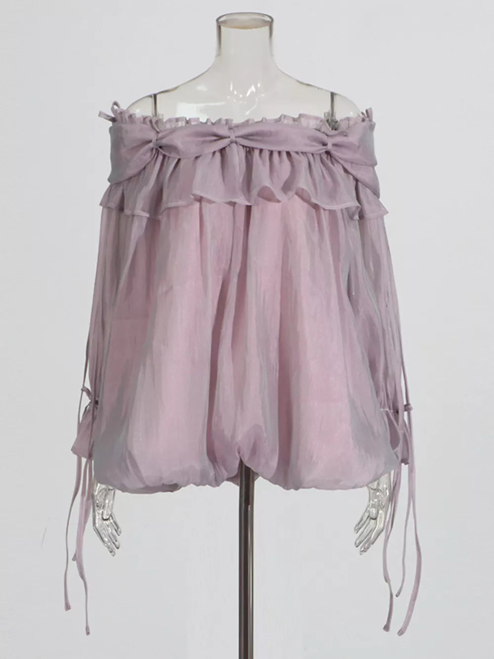 Light purple off-shoulder ruffled maternity blouse with bow details and adjustable tie sleeves
