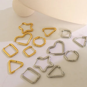 Geometric steel huggie earrings in gold and silver star, heart, triangle, square, and rectangle shapes.