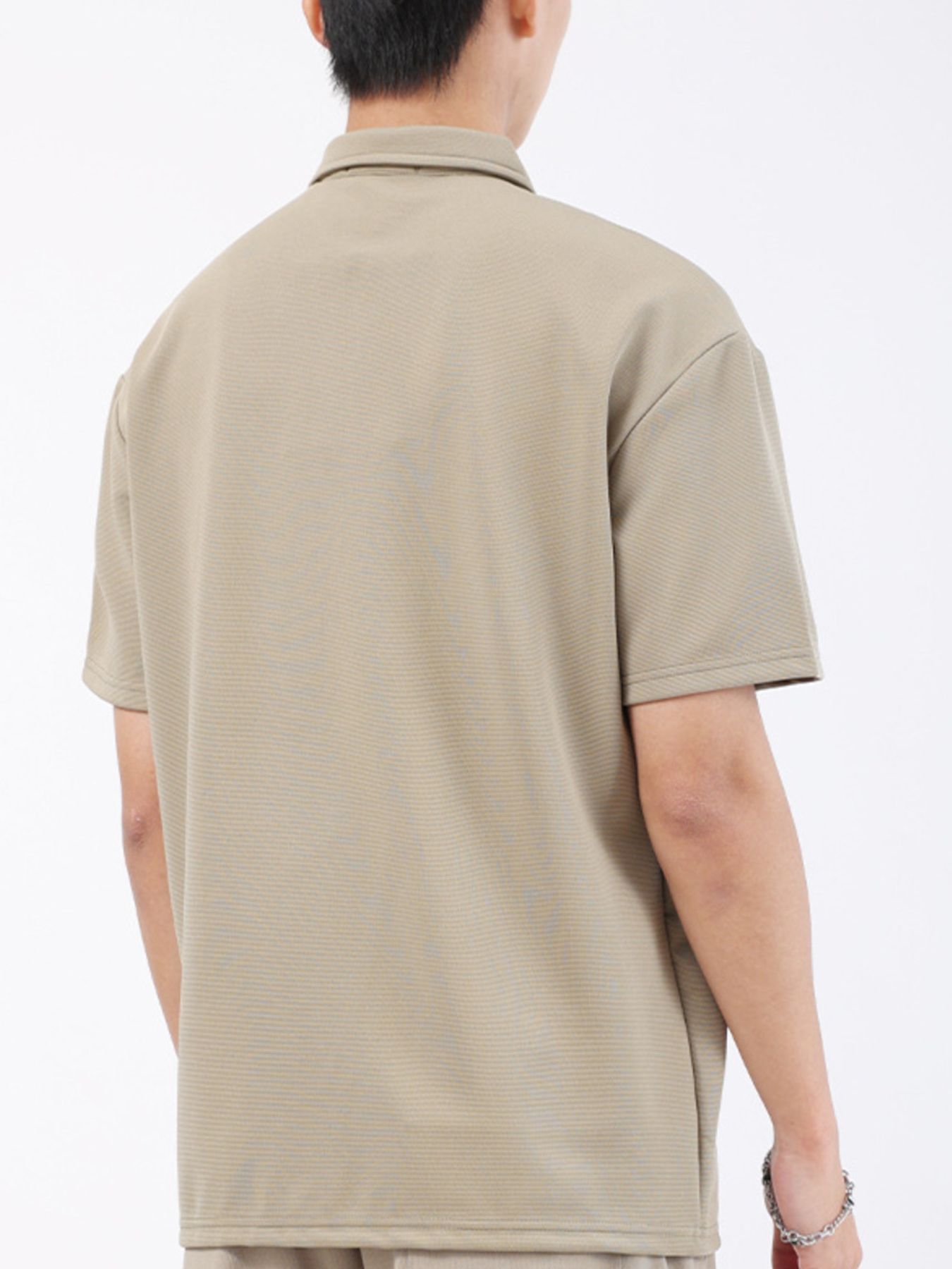 Khaki textured performance polo shirt for men, short sleeves, classic collar.