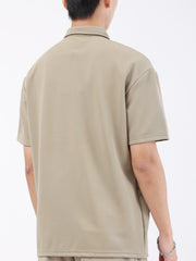 Khaki textured performance polo shirt for men, short sleeves, classic collar.