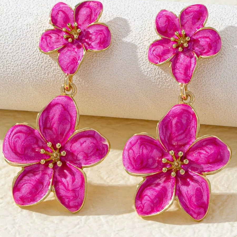 Fuchsia pink flower dangle earrings with 18K gold plated details.