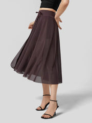 Flowy midi skirt in coffee with drawstring waist and shorts liner.