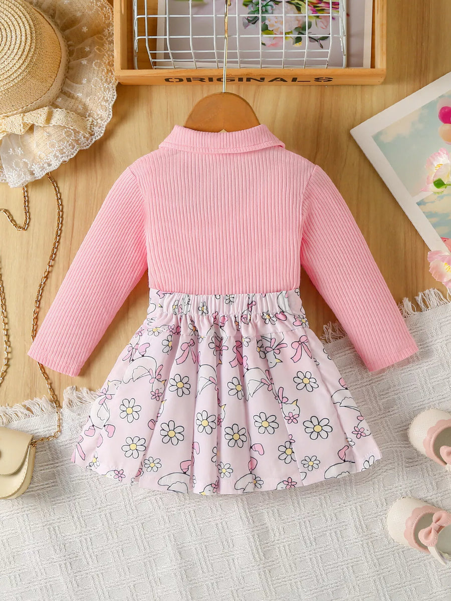 Baby girl pink ribbed polo and floral bunny print skirt set