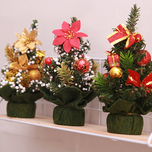 Miniature festive forest holiday centerpieces with red, gold, and multicolor adornments.