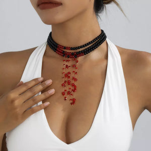 Resin,Zinc alloy Care instructions: Avoid wearing during exercise, as sweat will necklace in red with fitted silhouette