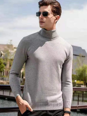 Men's gray turtleneck sweater with a modern silhouette and ribbed cuffs and hem.
