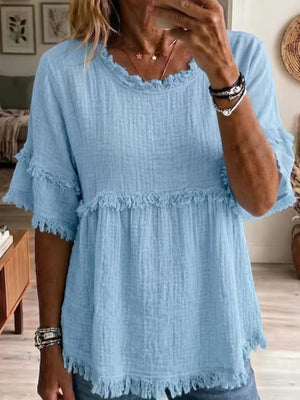 blouse in sky blue featuring fringe and relaxed fit