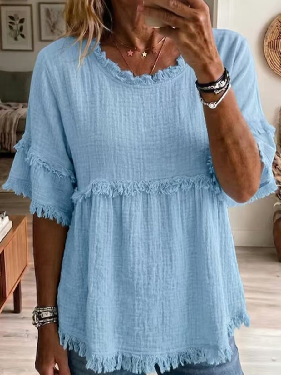 blouse in sky blue featuring fringe and relaxed fit