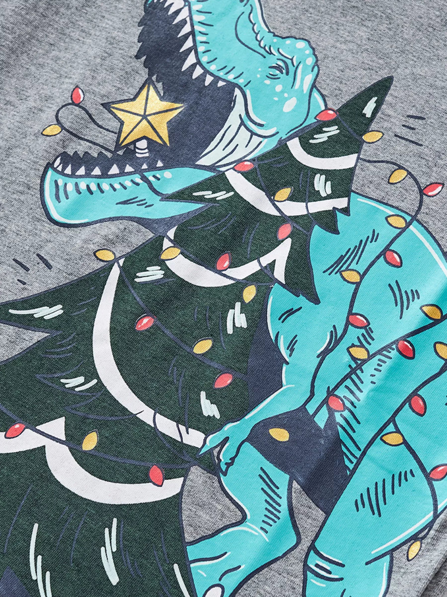 Gray cotton t-shirt with a dinosaur tangled in Christmas lights graphic.