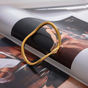 18K Gold-Plated,Stainless Steel,Rhinestone Care instructions: Avoid wearing duri bracelet in Gold with regular silhouette