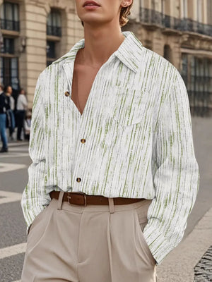 Relaxed fit white shirt with green textured stripes, button front, and chest pocket.