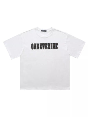White cotton oversized t-shirt with black graphic logo print on chest.