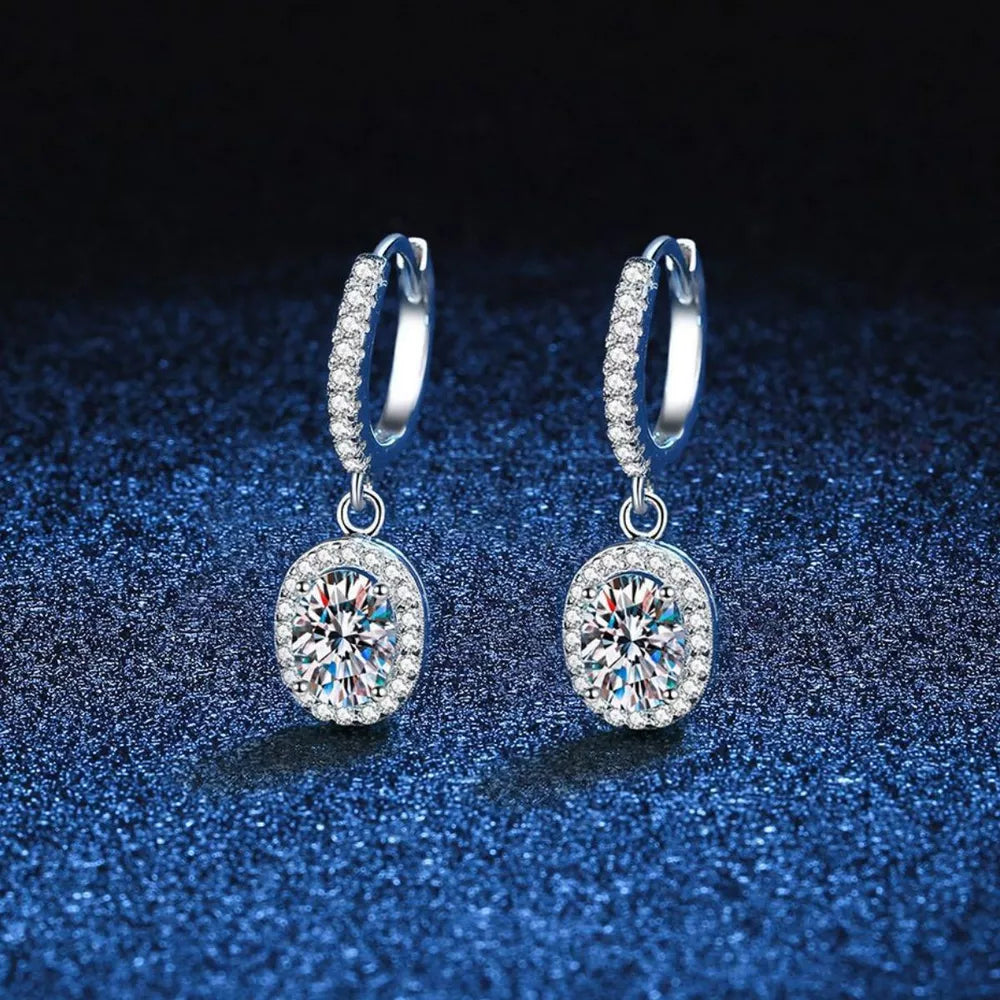 earrings in silver featuring moissanite stones and drop fit