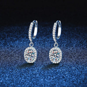 earrings in silver featuring moissanite stones and drop fit