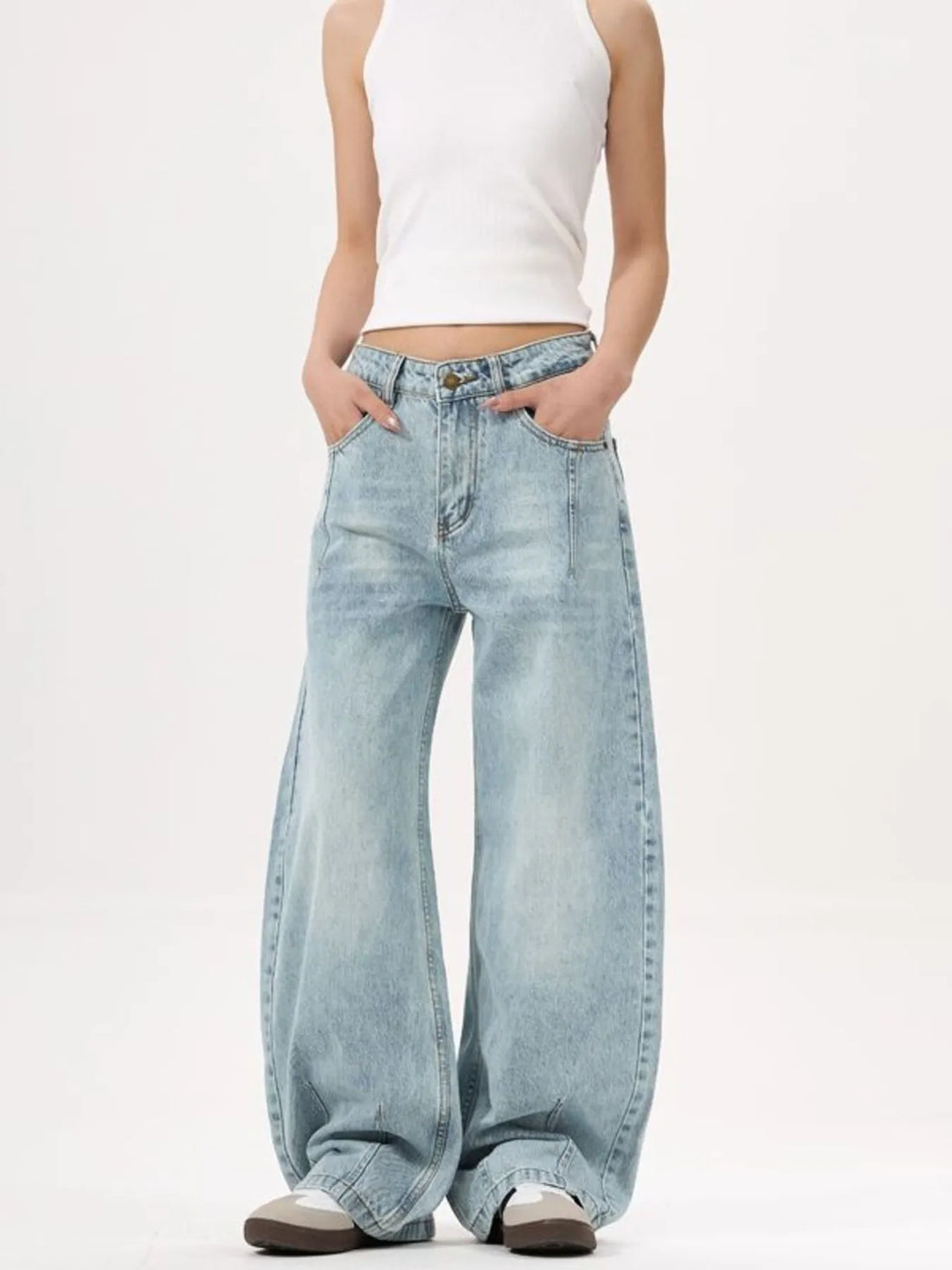 Men's light blue wide-leg stretch jeans with a relaxed fit and classic silhouette.