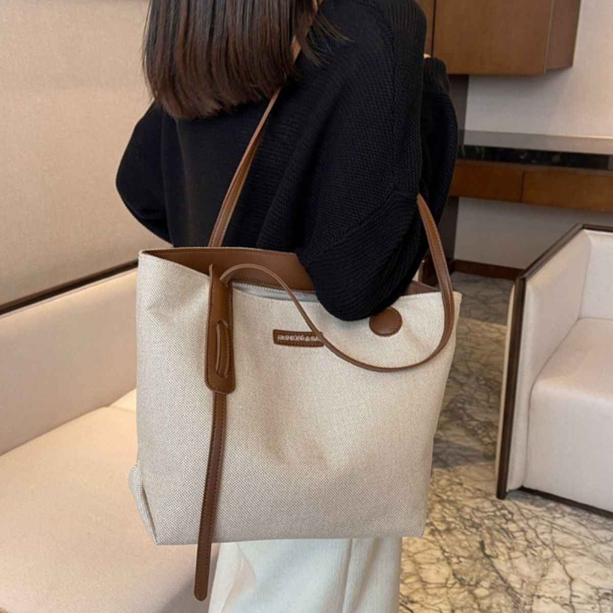 Large canvas shoulder bag with leather trim and strap detail