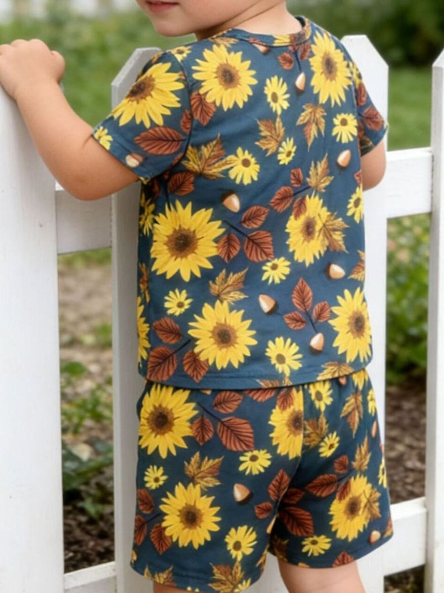 Baby girls' short sleeve top and shorts set with sunflower and autumn leaf print.